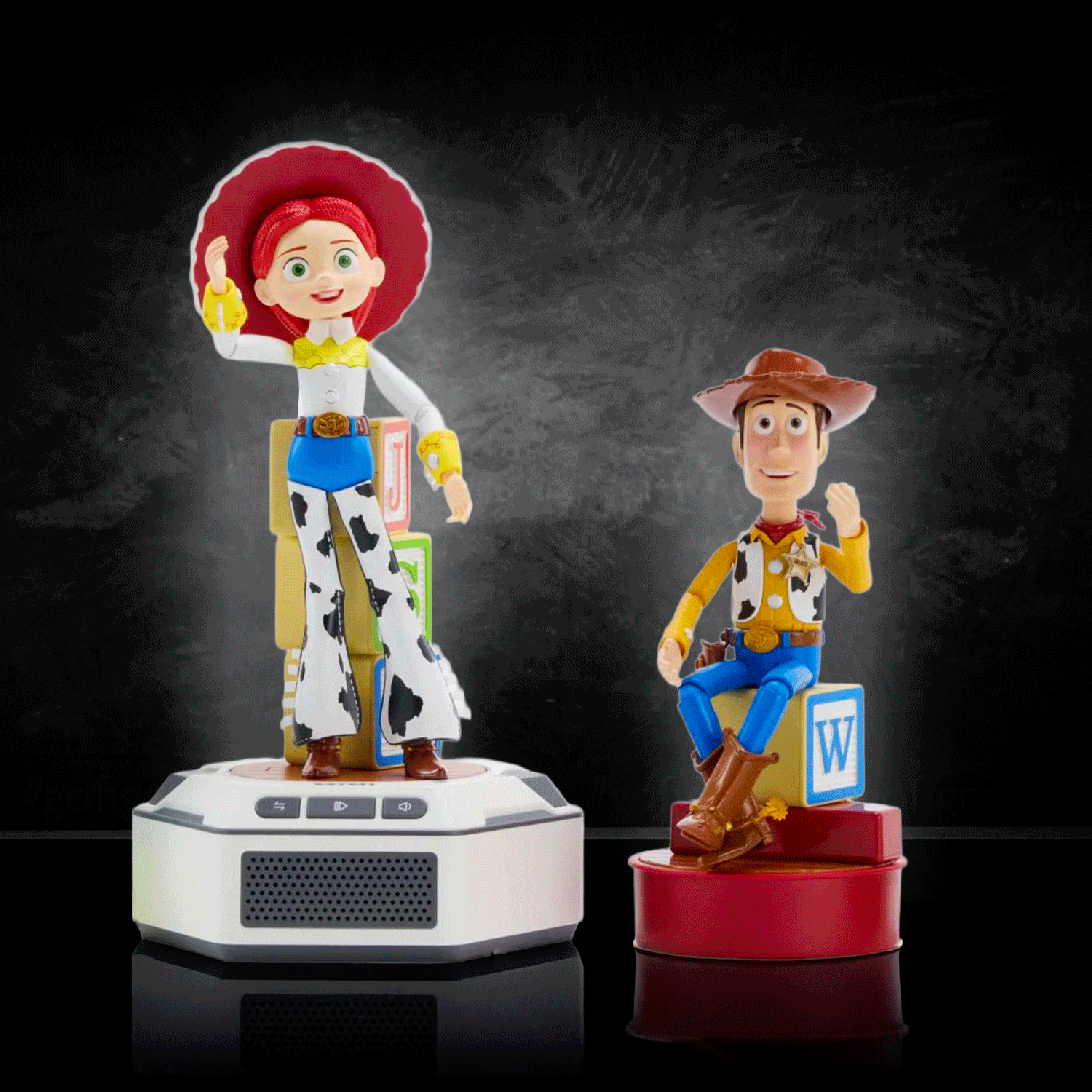 Woody and Jessie mini robot figures with bases by Robesen Robotics, posed against dark background on reflective surface