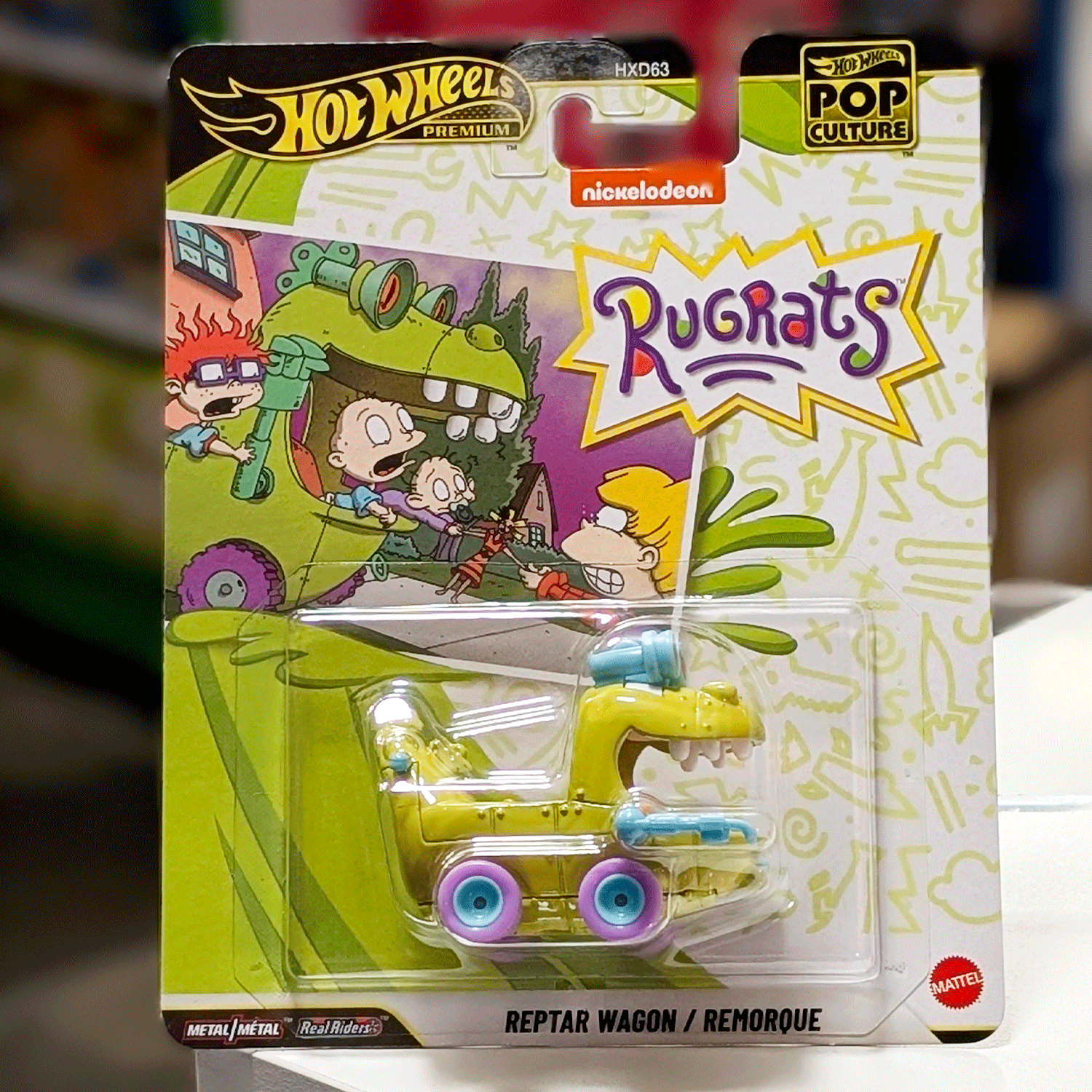 Mattel Hot Wheels Pop Culture 2026 Rugrats Reptar Wagon die-cast vehicle in vibrant packaging front view