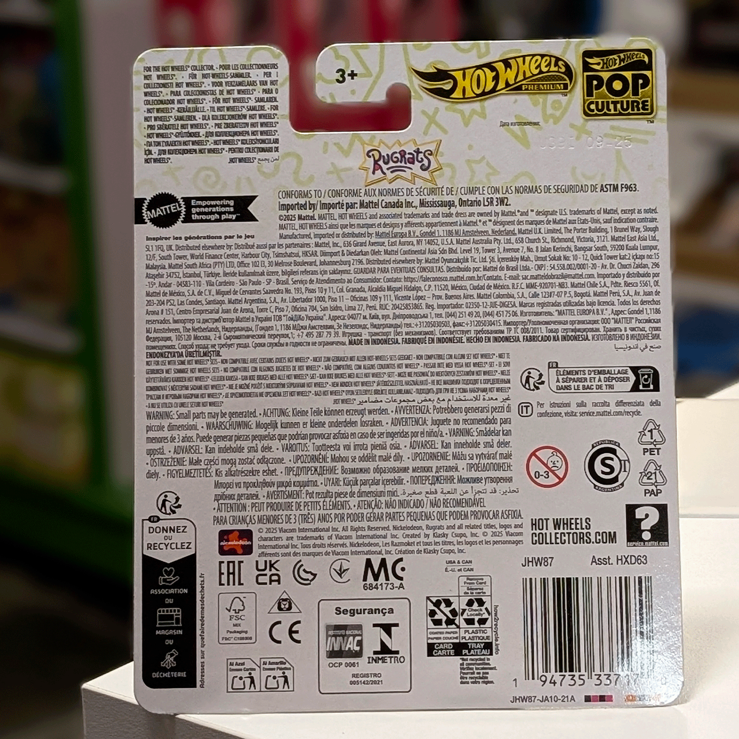 Mattel Hot Wheels Rugrats Reptar Car Pop Culture 2026 packaging back view with safety and product information visible