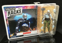 Vitruvian H.A.C.K.S. action figure in packaging with 'Samhain' branding on a dark background