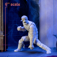 6-inch Scooby-Doo Mummy of Ankha action figure by Jada Toys posed mid-lurch in dark spooky setting