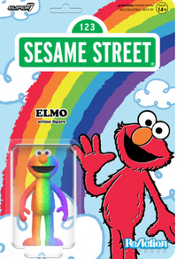 Elmo Sesame Street action figure with rainbow gradient colors on retro-style card featuring clouds and rainbow design