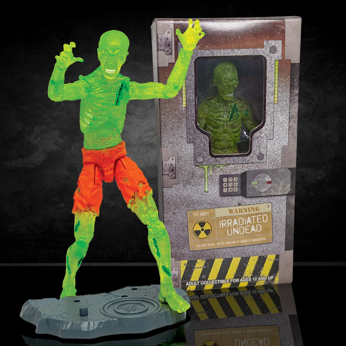 Green radioactive zombie figure with orange pants next to its packaging on a dark background