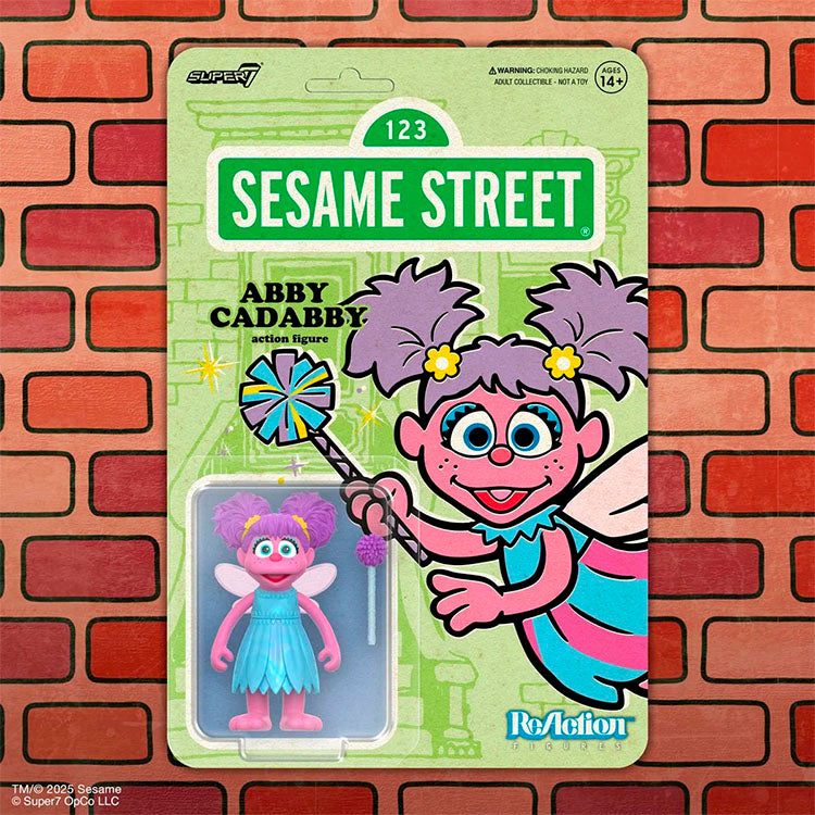 Super7 Sesame Street Abby Cadabby 3.75-inch ReAction Figure collectible in mint packaging on brick background
