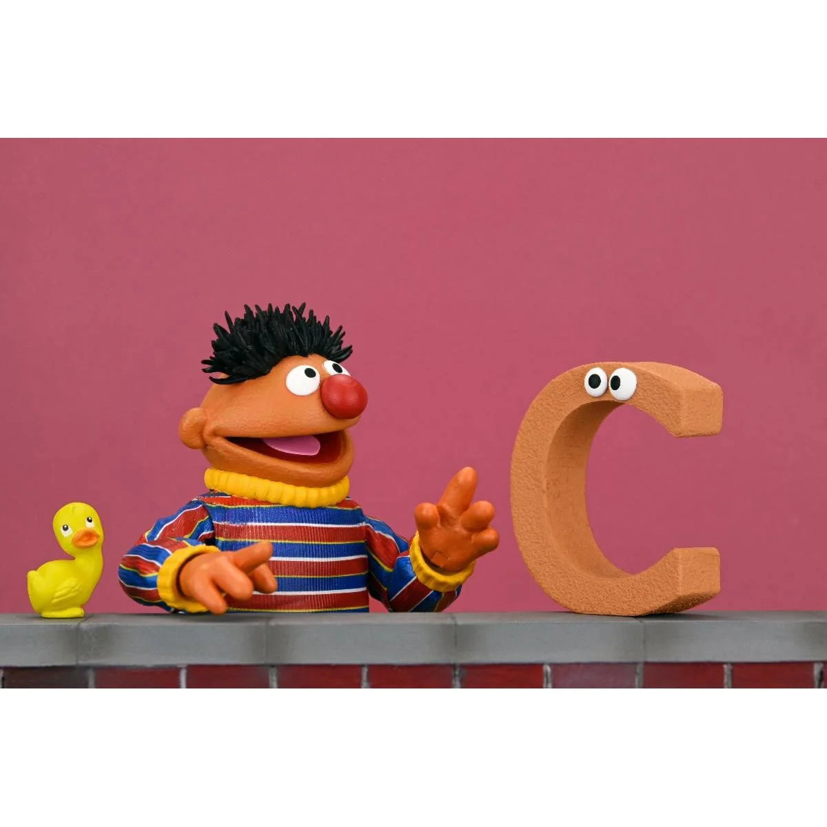 Ernie - Sesame Street Ultimate NECA 7-Inch Scale Action Figure with rubber ducky and letter C collectible new in box