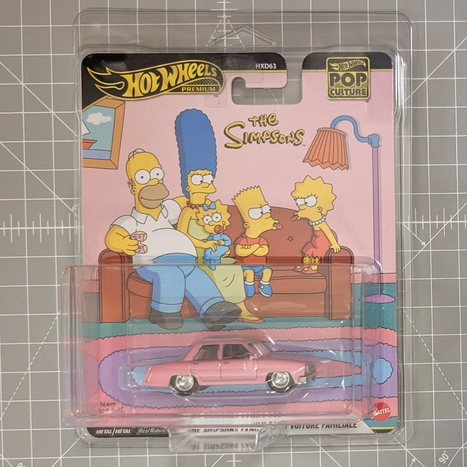 Hot Wheels Pop Culture The Simpsons package with a pink classic car and family artwork