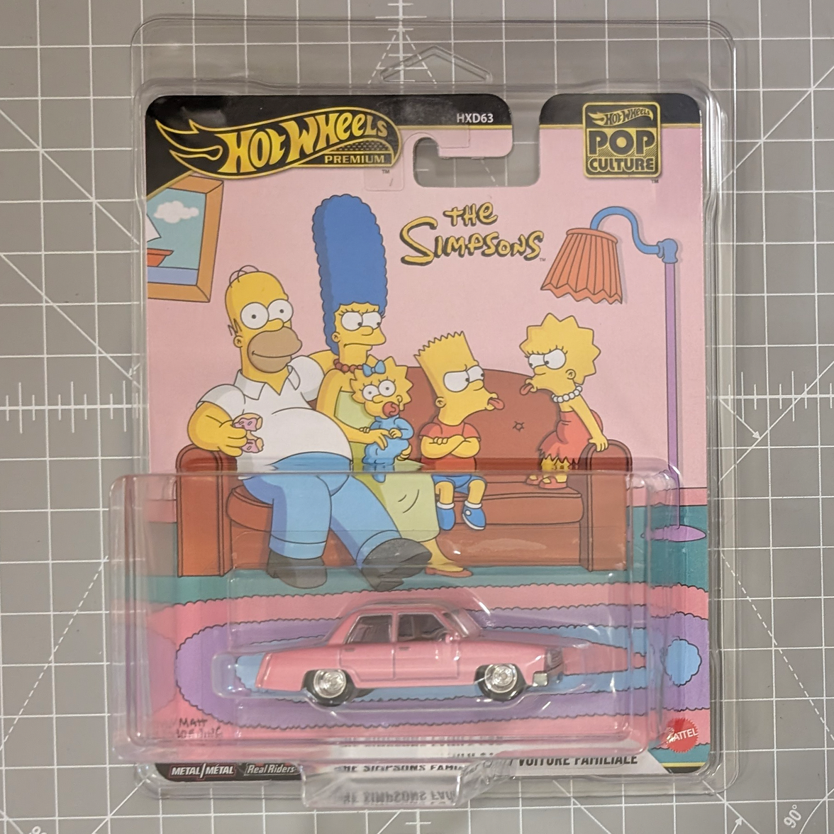 Hot Wheels Pop Culture The Simpsons package with a pink classic car and family artwork