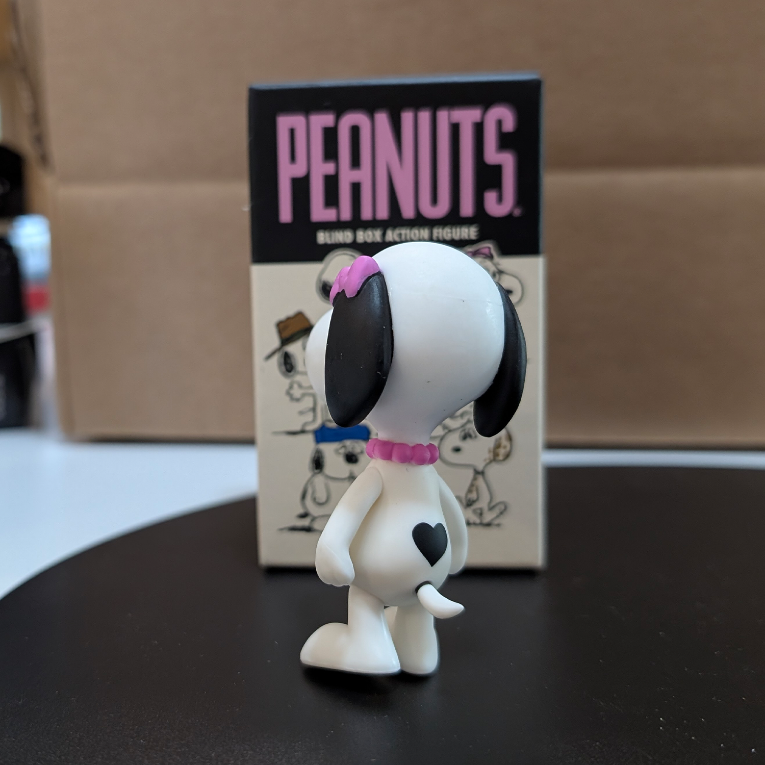 Snoopy's Family - ReAction Figures 3.75" from Charles M. Schulz's Peanuts by Super7 new in box collectible figure with pink bow and heart mark