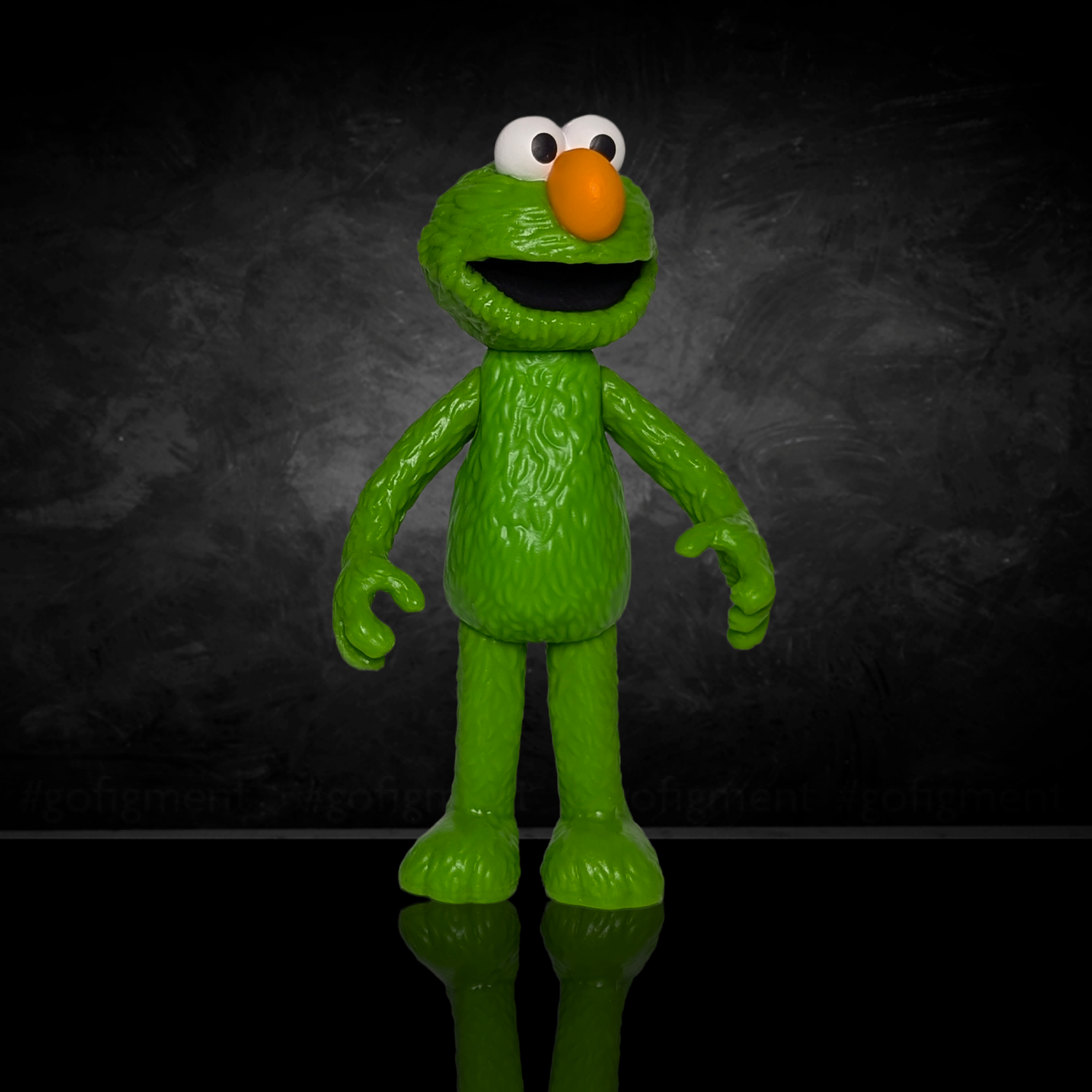So Many Elmos! Sesame Street Blind Box Wave 4 Go Figment figure in bright green with orange nose and wide eyes