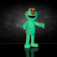 So Many Elmos! Sesame Street Blind Box Wave 4 figure by Go Figment glowing green with orange nose and wide eyes