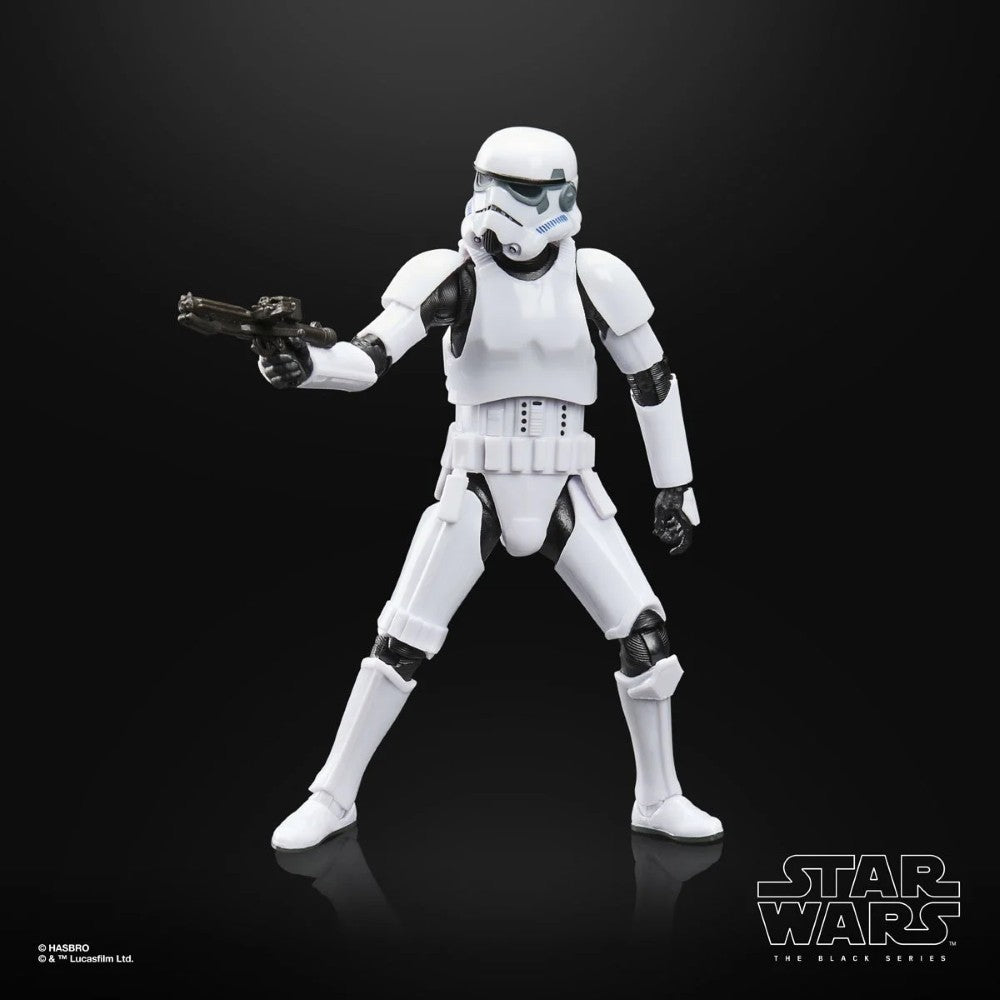 Star Wars The Black Series Droids Imperial Stormtrooper Action Figure (Creased Cardback) by Hasbro posed with blaster