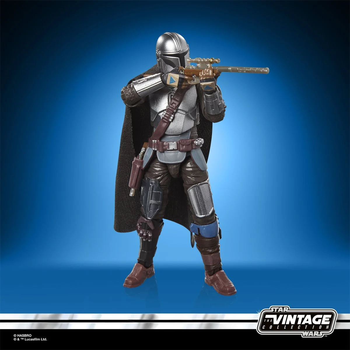 Star Wars The Vintage Collection The Mandalorian & Grogu Deluxe 3 3/4-Inch Action Figure by Kenner posed with rifle accessory