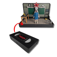 VHS Stars Stranger Things Eleven vs. Demogorgon Diorama Playset by Console Heroes with detailed VHS tape design