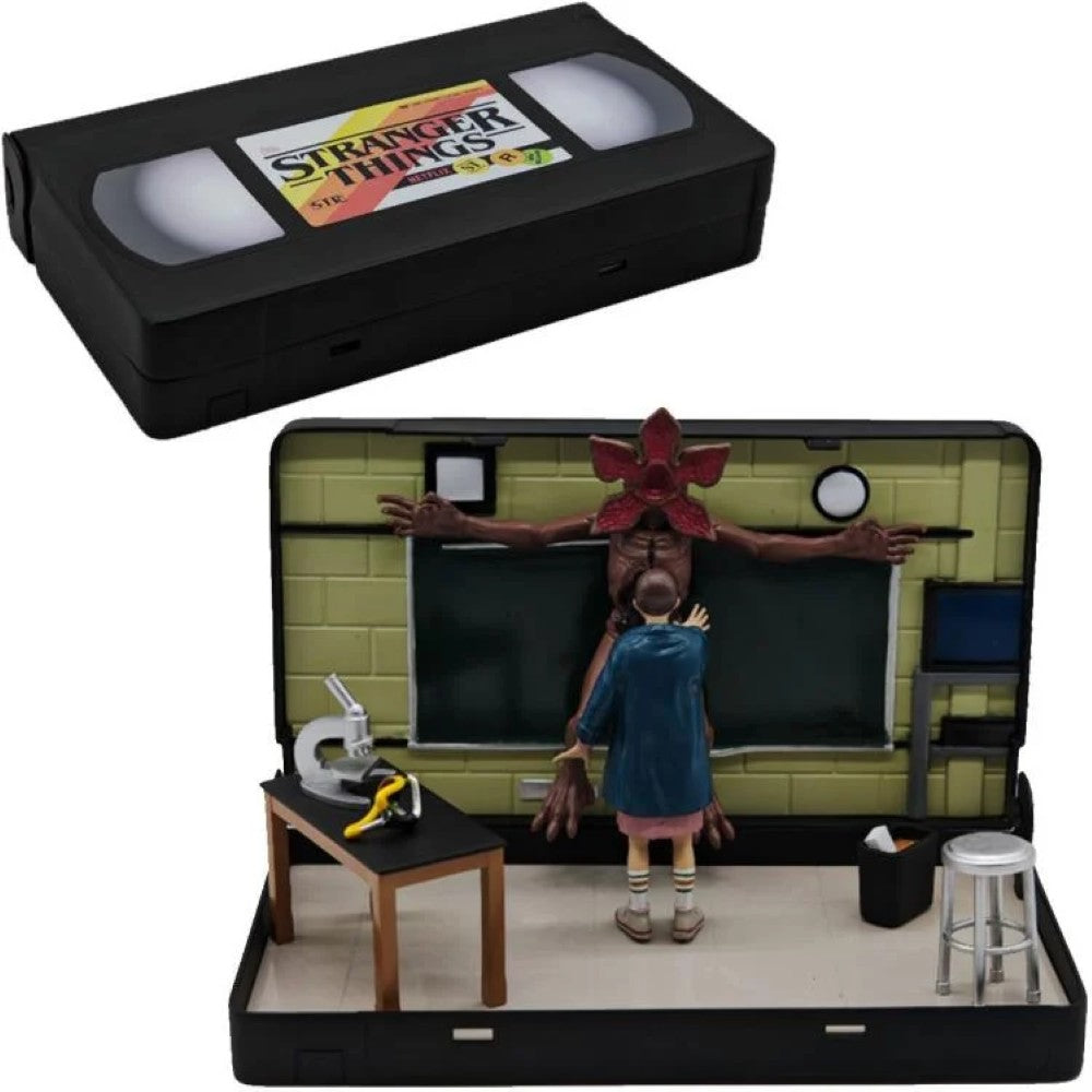 VHS Stars Stranger Things Eleven vs. Demogorgon Diorama Playset by Console Heroes in VHS tape style case.