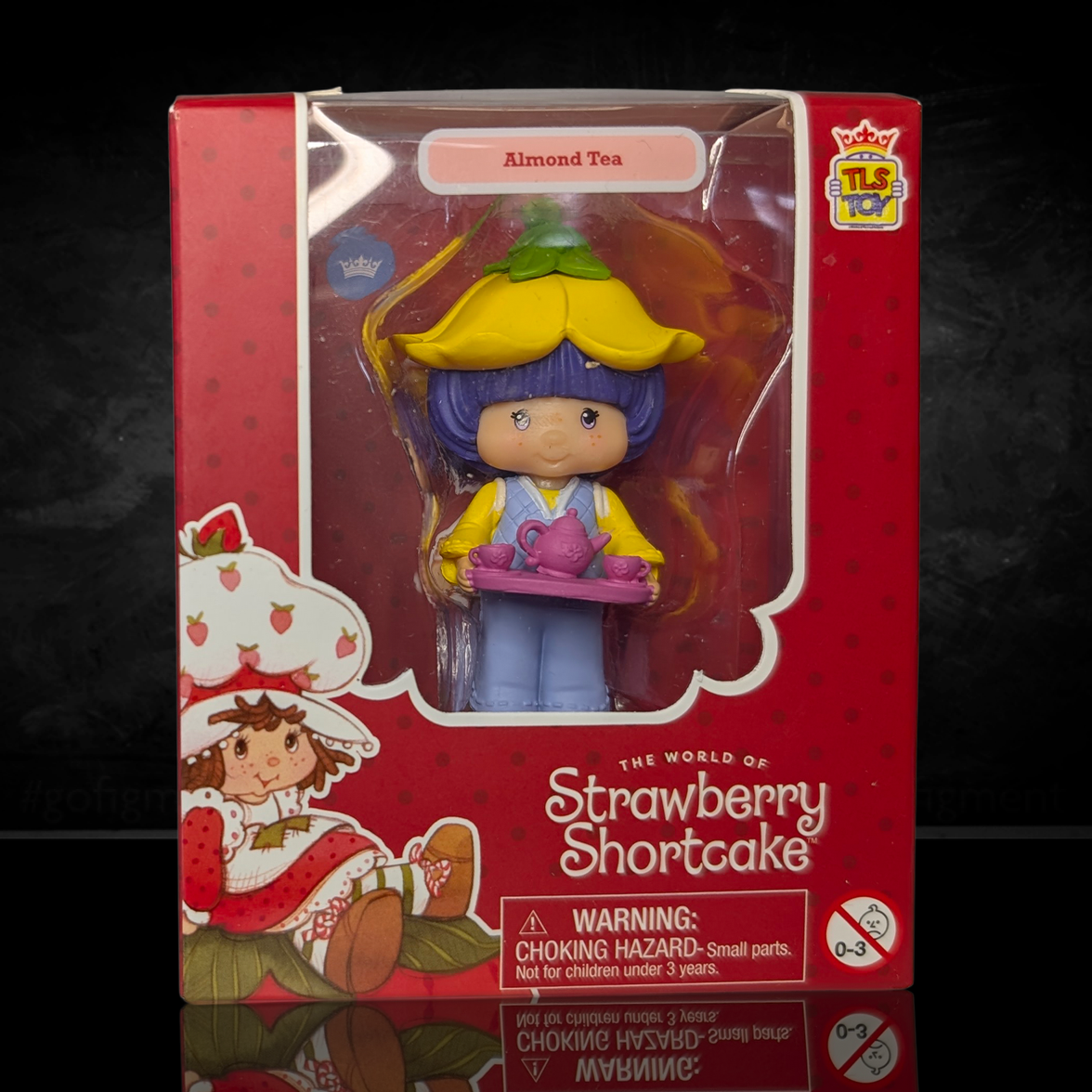 Strawberry Shortcake 2.5" Almond Tea Cheebee Figure by Loyal Subjects in red box with character holding tea set