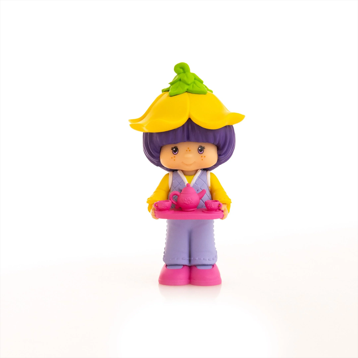 Strawberry Shortcake 2.5" Almond Tea Cheebee Figure by Loyal Subjects holding a pink tea set with purple hair and yellow hat