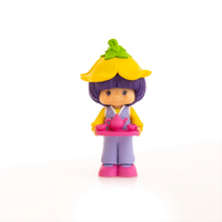 Strawberry Shortcake 2.5" Almond Tea Cheebee Figure by Loyal Subjects holding a pink tea set with purple hair and yellow hat