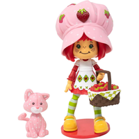 Boss Fight Studio Llc Strawberry Shortcake deluxe figure with pink hat, striped green tights, yellow shoes, and picnic basket accessory