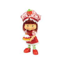 Loyal Subjects Strawberry Shortcake 5 1/2-inch fashion doll in Party Pleaser Outfit holding strawberry dessert