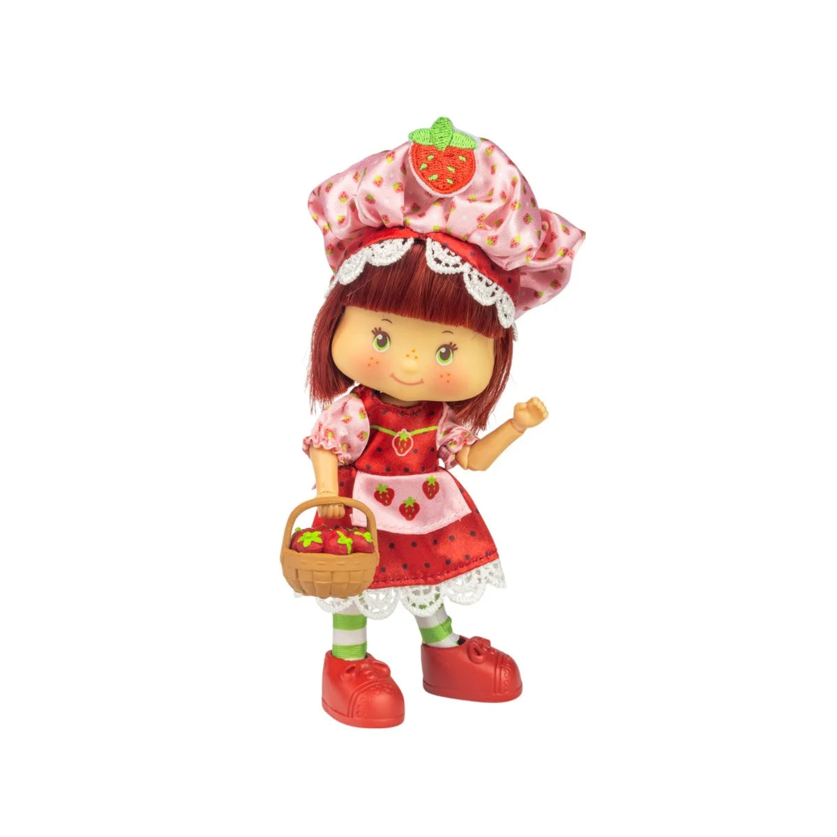 Loyal Subjects 5 1/2-inch Strawberry Shortcake Party Pleaser doll in pink strawberry outfit holding basket accessory