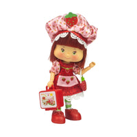 5 1/2-inch Loyal Subjects Strawberry Shortcake doll in Party Pleaser outfit with lunchbox and strawberry hat