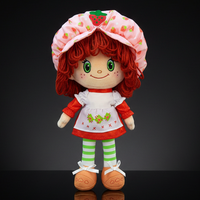 Strawberry Shortcake plush doll with soft yarn hair wearing pink bonnet and red dress by Loyal Subjects on black background