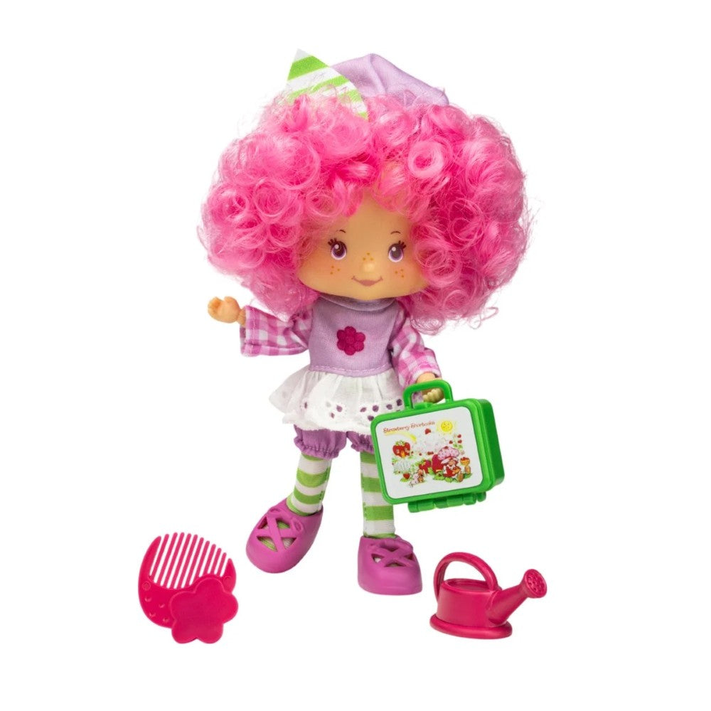 5 1/2-inch Loyal Subjects Strawberry Shortcake Raspberry Tart doll with pink curly hair and garden accessories