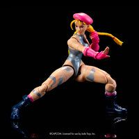 Jada Toys Cammy in Pink and Silver Ultra Street Fighter II 6-inch action figure in dynamic fighting pose against black background