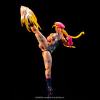 Jada Toys Ultra Street Fighter II Cammy Pink and Silver 6-inch action figure with dynamic kick pose and fire effect