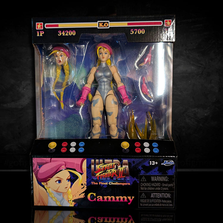 Jada Toys Ultra Street Fighter II Cammy in pink and silver 6-inch action figure in packaging with accessories