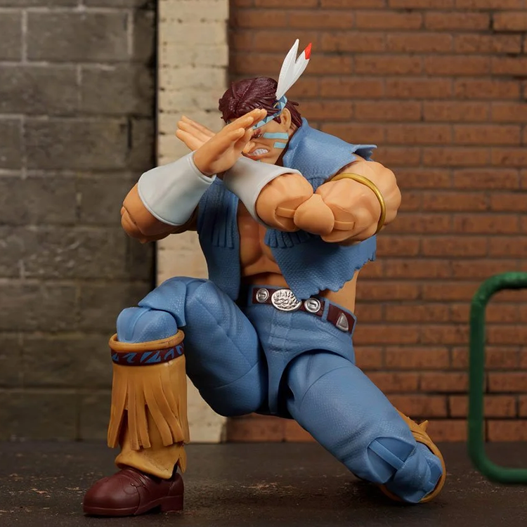 Ultra Street Fighter II T. Hawk 6-Inch Scale Deluxe Action Figure by Jada Toys posed in dynamic action stance