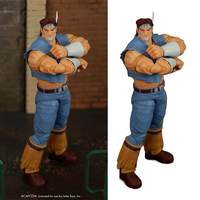 Ultra Street Fighter II T. Hawk 6-Inch Scale Deluxe Action Figure by Jada Toys posed with crossed arms and detailed outfit.