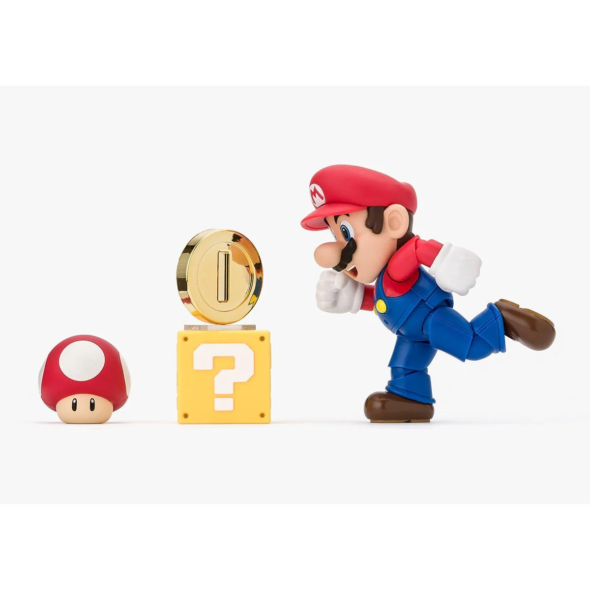 Super Mario Bros Mario S.H.Figuarts Action Figure by Bandai Tamashii Nations with coin block and mushroom by SH Figuarts.
