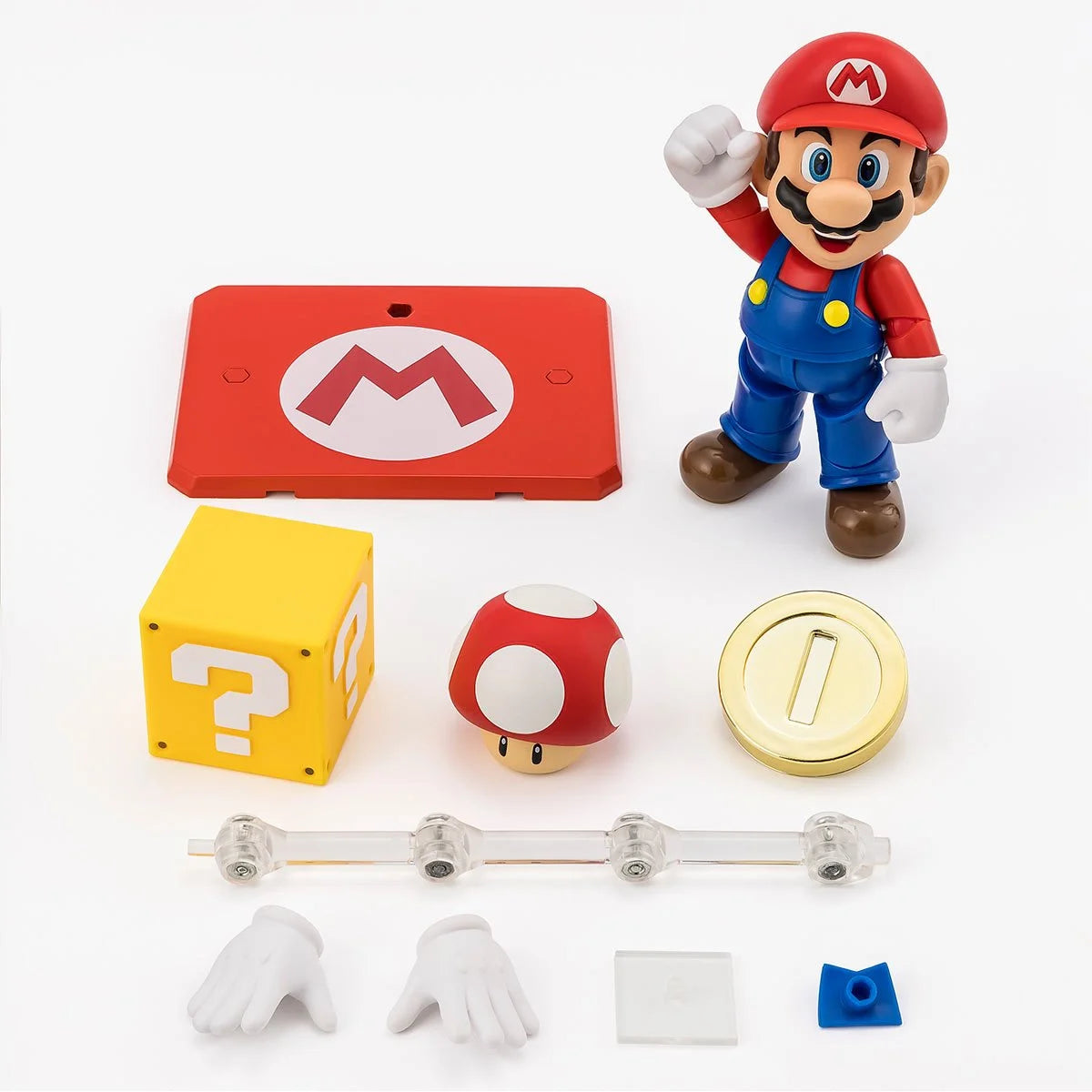Super Mario Bros Mario S.H.Figuarts Action Figure by Bandai Tamashii Nations with accessories including question block and mushroom, by SH Figuarts