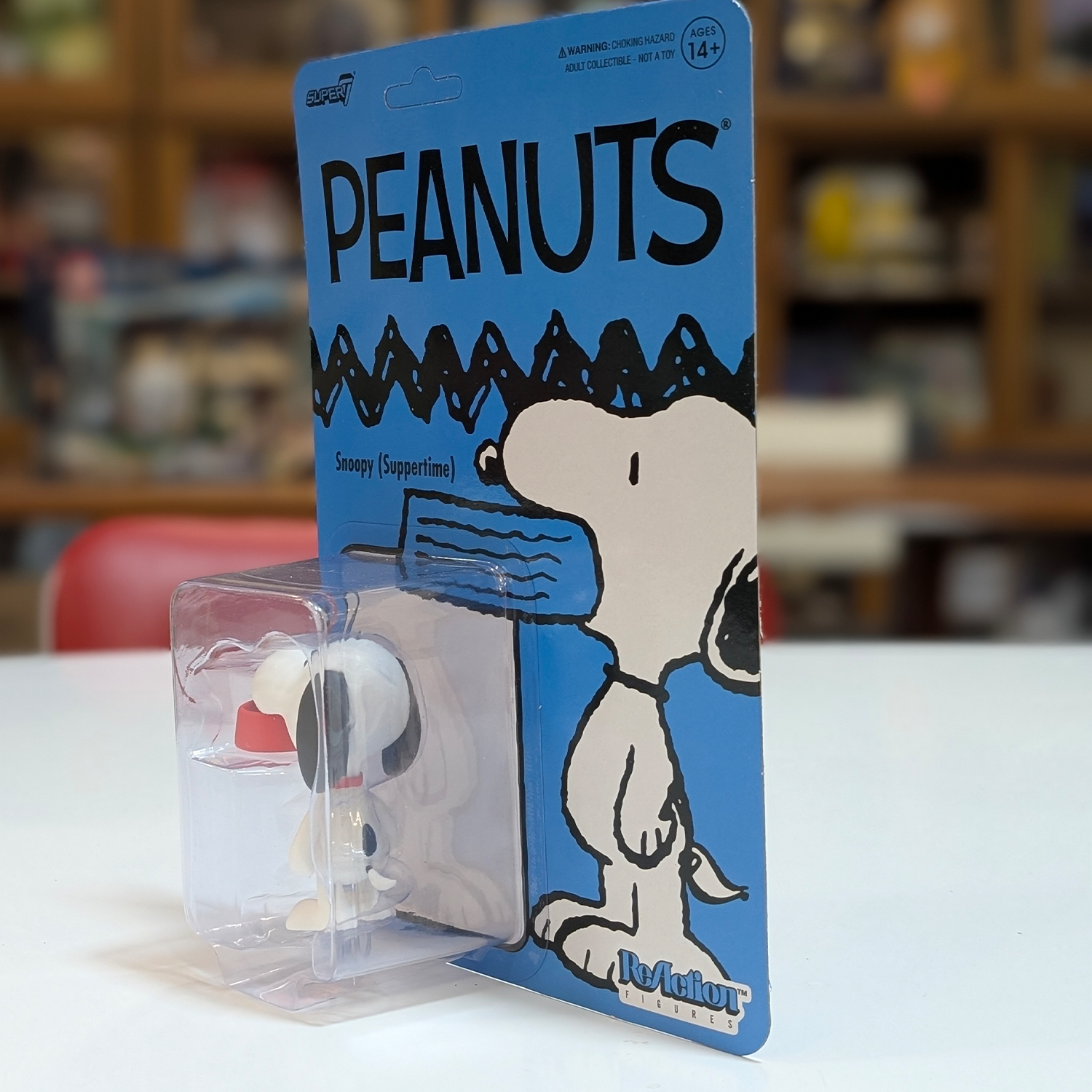 Snoopy Suppertime Peanuts ReAction Wave 09 Action Figure Super7 new in box collectible with blue cardback and plastic blister pack