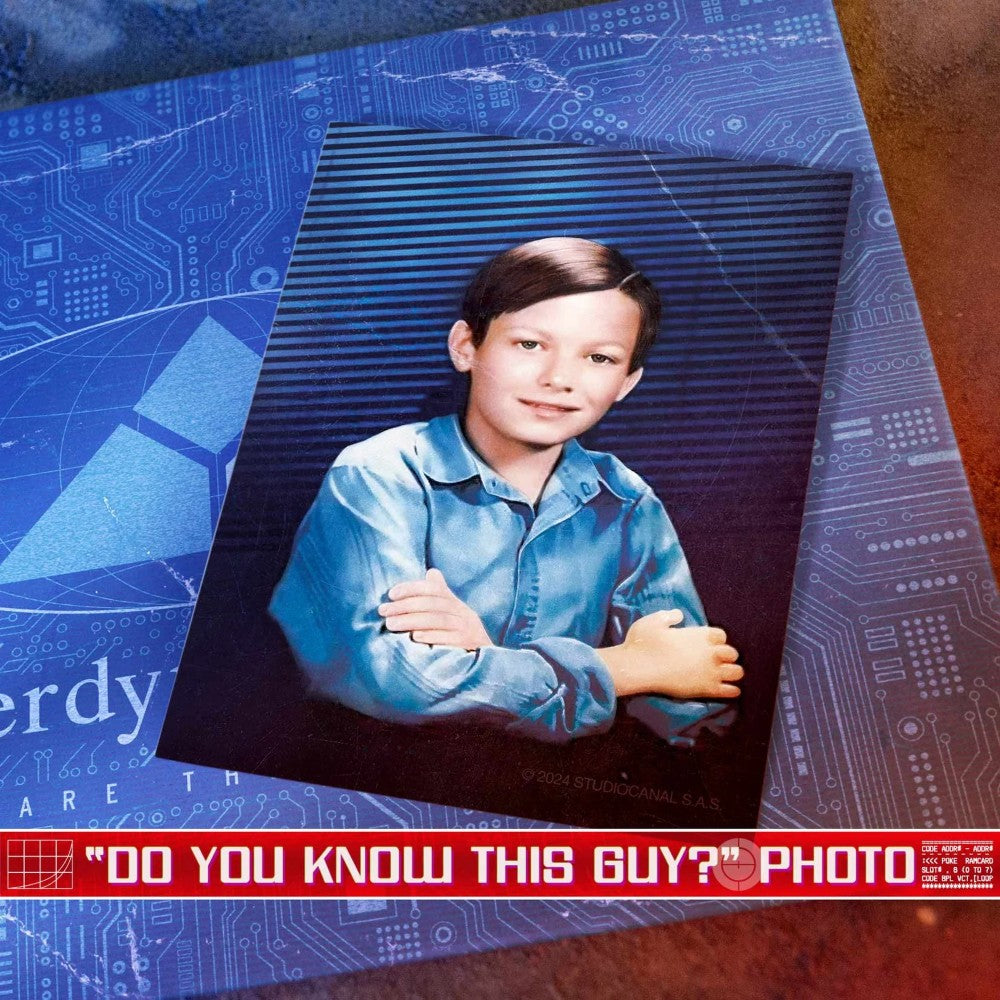 Vintage style photograph of a young boy with crossed arms on a Cyberdyne Systems circuit board by Doctor Collector