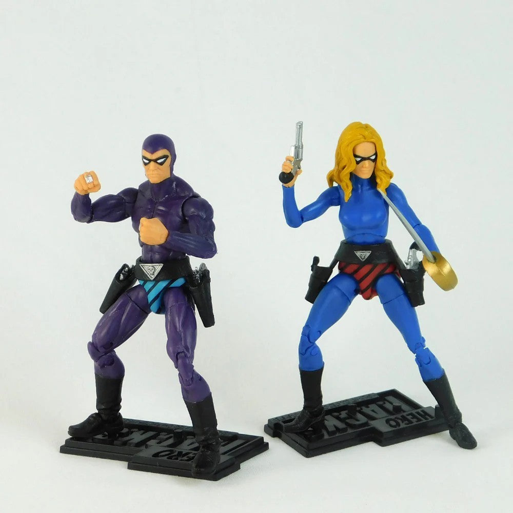 Two action figures, one in purple and black, the other in blue and black, on a white background.