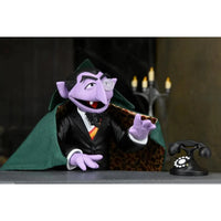 The Count - Sesame Street Ultimate NECA 7-Inch Scale Action Figure in green cape with leopard lining new in box collectible by Neca