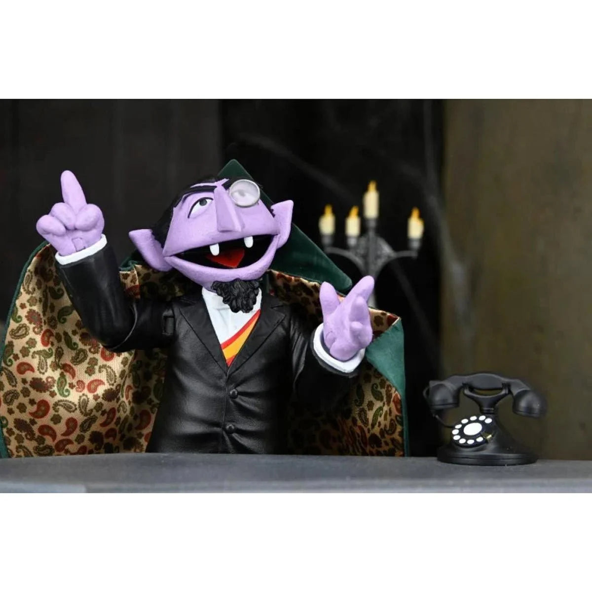 The Count - Sesame Street Ultimate NECA 7-Inch Scale Action Figure in black suit with patterned cape new in box collectible