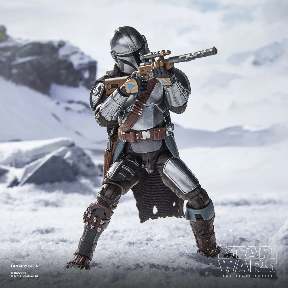 The Mandalorian & Grogu Deluxe Star Wars The Black Series 6-Inch Action Figure in detailed armor, posed with rifle in snowy environment new in box