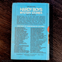 Vintage 1959 Hardy Boys Mystery Stories book back cover listing titles by Grosset & Dunlap New York publisher