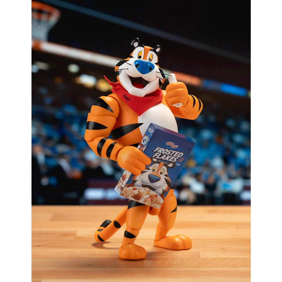 Frosted Flakes Tony the Tiger 6-Inch Action Figure – It’s GRRREAT! by Jada Toys new in box holding cereal box with thumbs up
