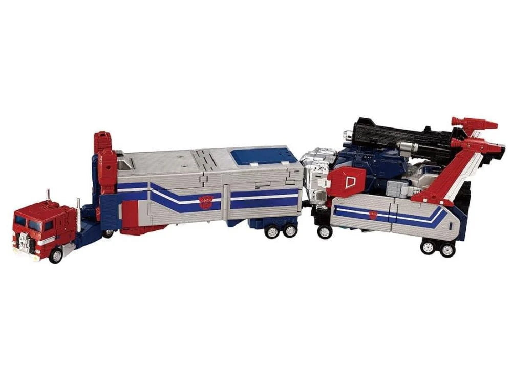 Hasbro Collectibles - Transformers - Takara Tomy - MPG-14 Godbomber Converting Action Figure in vehicle mode with trailer and weapon attachments