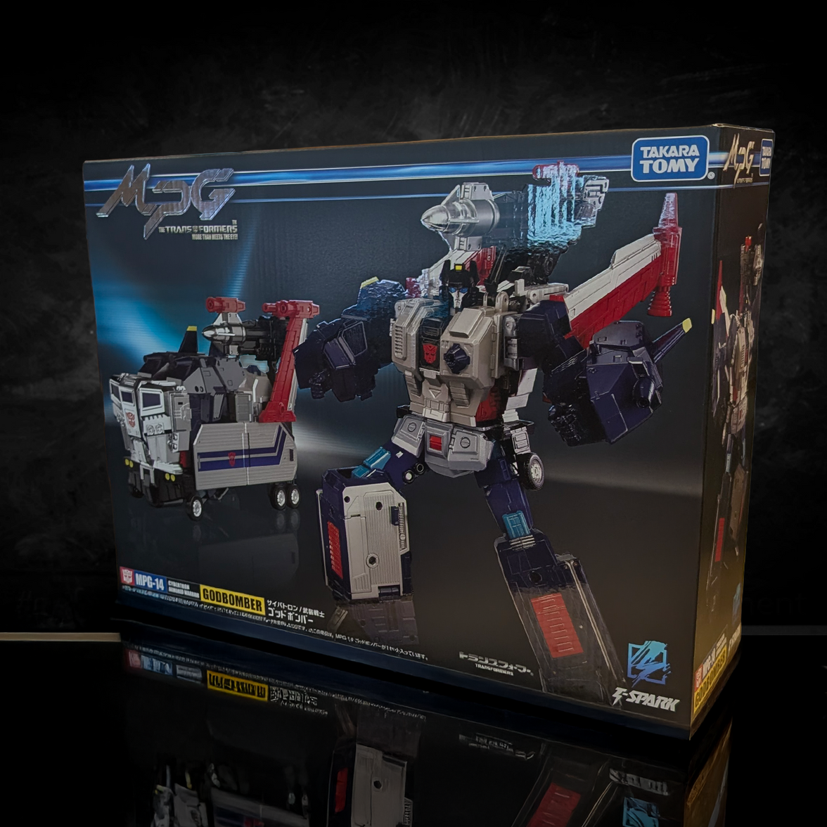 Hasbro Collectibles - Transformers - Takara Tomy - MPG-14 Godbomber Converting Action Figure packaging showcasing robot and vehicle modes
