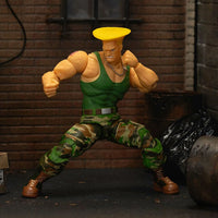 Jada Toys Ultra Street Fighter II Colonel Guile 6-inch action figure in green tank top and camo pants pose
