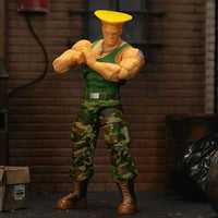 Jada Toys Ultra Street Fighter II Colonel Guile 6-inch action figure in green tank top and camo pants pose