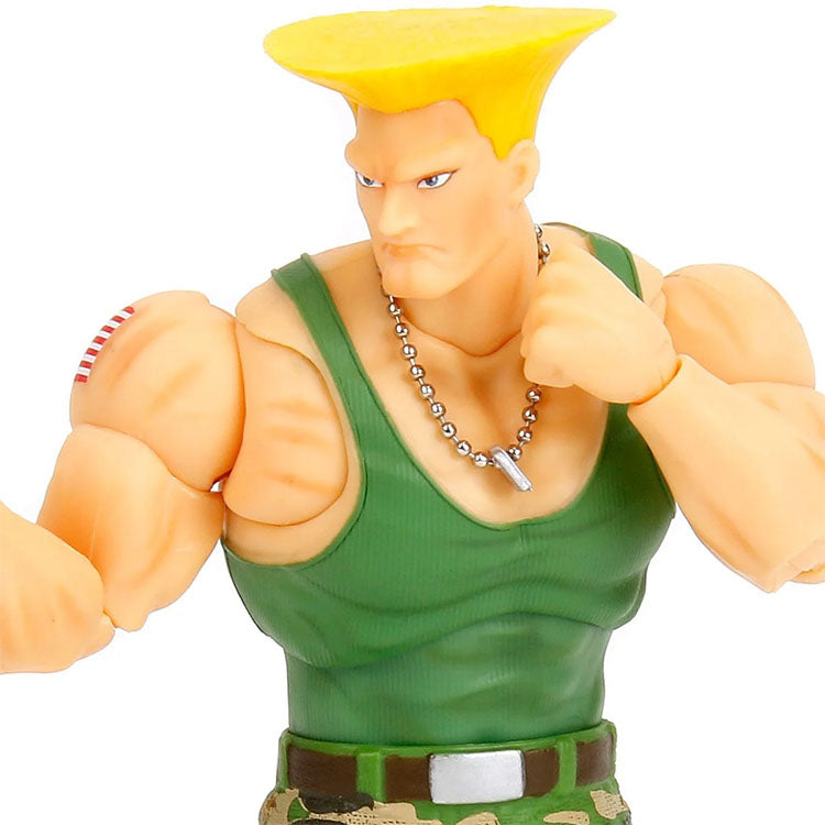 Jada Toys Ultra Street Fighter II Colonel Guile 6-inch action figure in green tank top with dog tag necklace