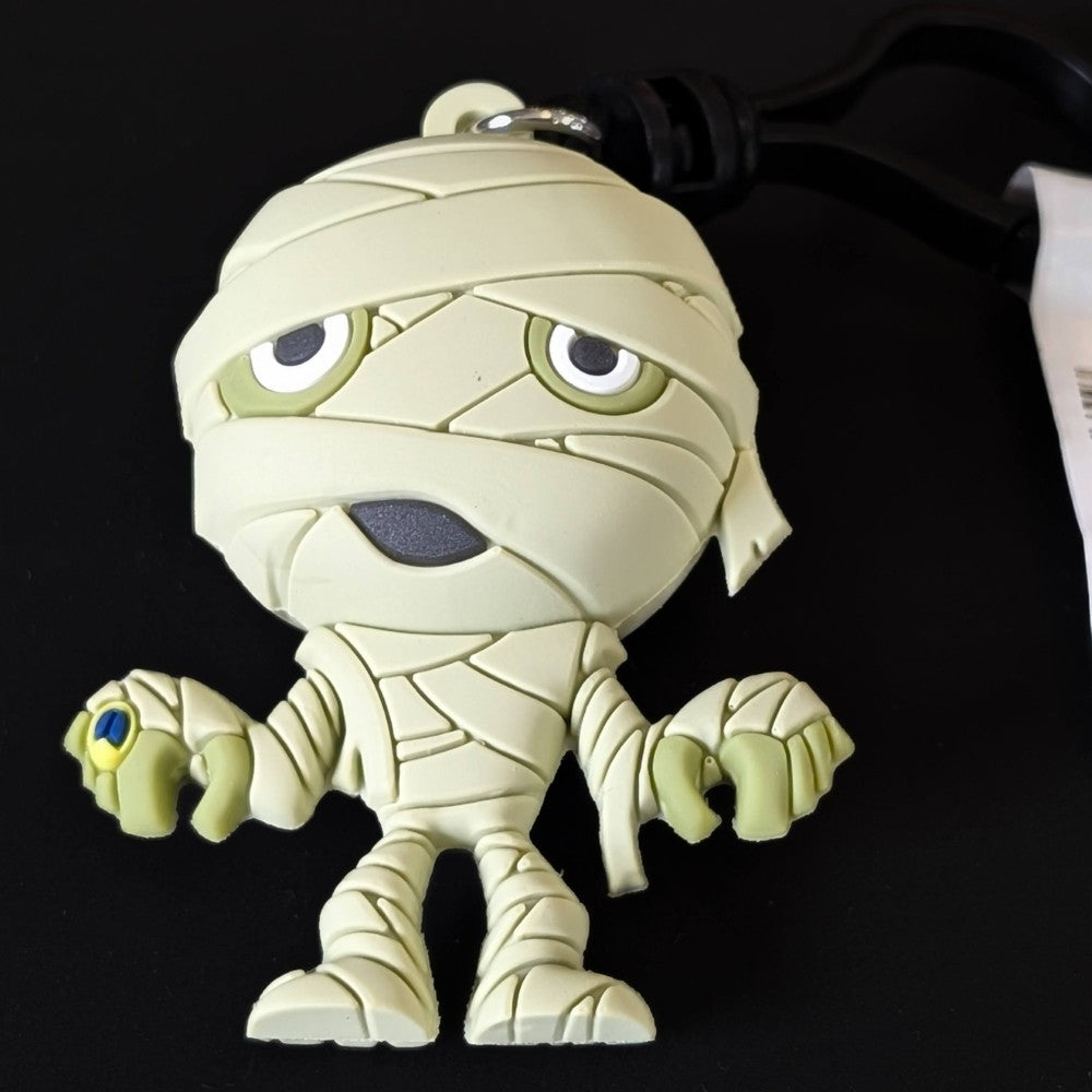 Go Figment Universal Monsters Series 4 3D foam bag clip featuring cartoon mummy figure with keyring attachment on black background