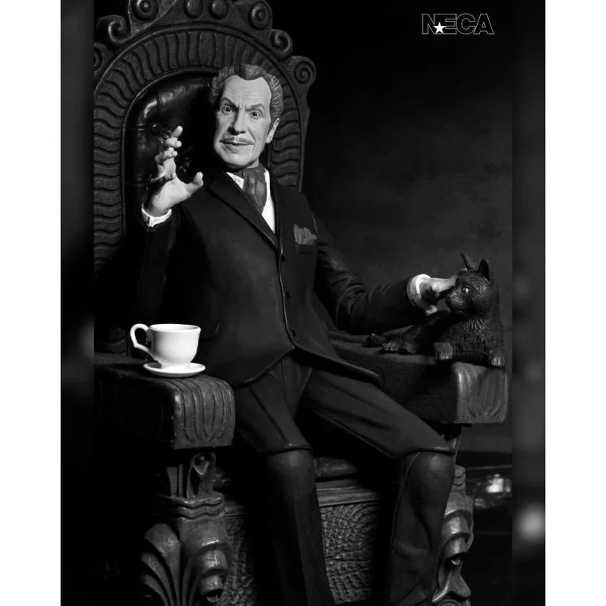 Vincent Price - Ultimate Silver Screen Edition B&W NECA 7-Inch Action Figure seated with black cat and teacup, new in box