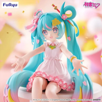 Hatsune Miku 10th Anniversary Noodle Stopper Statue FuRyu by Banpresto in white dress with pink floral accents and turquoise twin tails